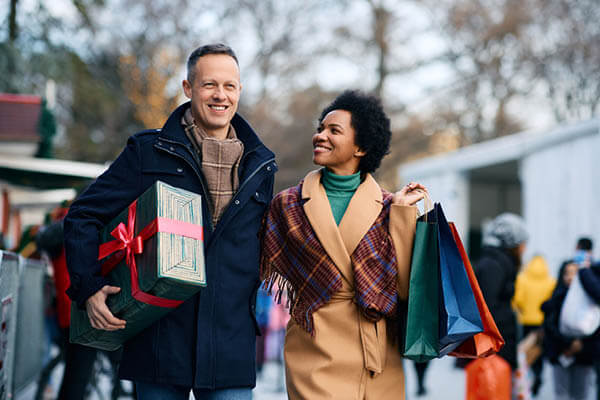 couple enjoying the holidays after saving with a balance transfer