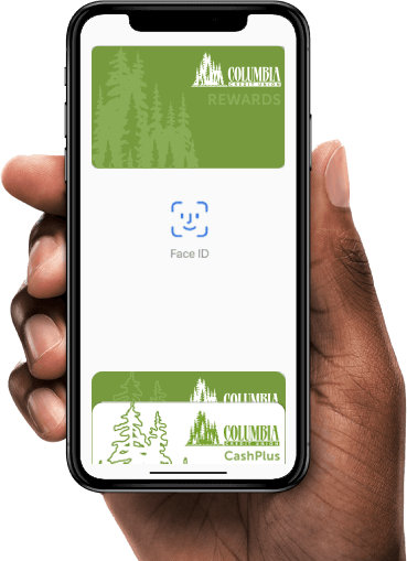 Man's hand holding smartphone using Columbia Credit Union Rewards Credit Card in mobile wallet