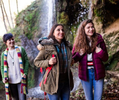 Young Women Admiring Great Waterfalls Women thinking about best CD rates near them